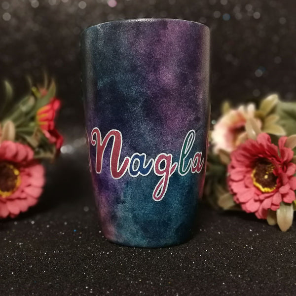 A Dark sky hand painted mug with the name "Nagla"