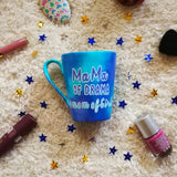 A blue hand painted mug with the words 