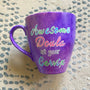 A Purple Galaxy hand painted mug with the words "Awesome Doula at your Cervix"