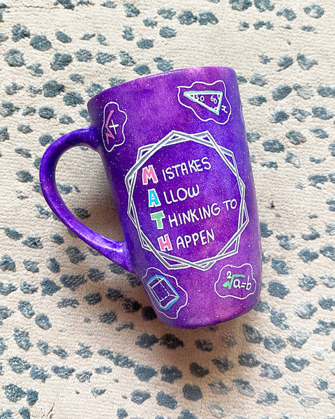 A Purple Galaxy Hand painted mug with the words "Mistakes Allow Thinking to happen" and math icons scattered all over 