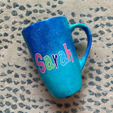 A Blue Galaxy Hand painted mug with the name 