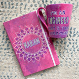 A Gift Set of mug and notebook in pink galaxy with the notebook having a mandala with the name mariam and the mug has the quote