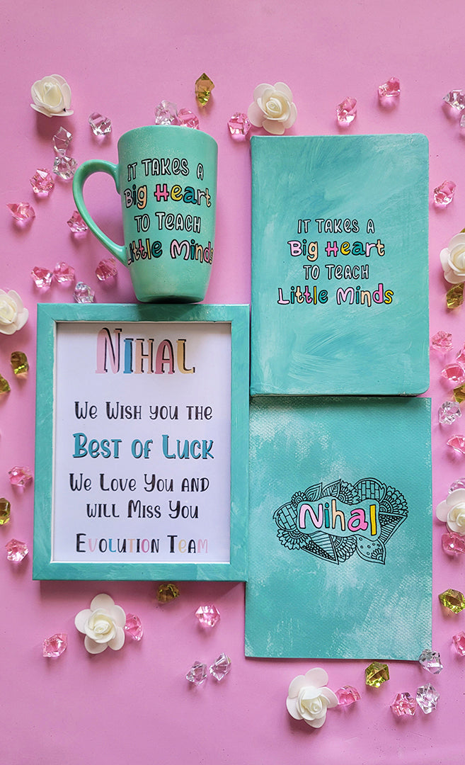 A Gift Set of  a mug, notebook frame and card all hand painted in mint. The mug and notebook with quote "it takes a big heart to teach little minds" and the frame and card have the name nihal