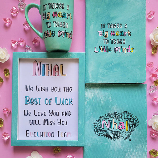 A Gift Set of  a mug, notebook frame and card all hand painted in mint. The mug and notebook with quote "it takes a big heart to teach little minds" and the frame and card have the name nihal