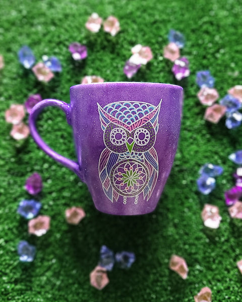 A Purple galaxy hand painted mug with an owl in zentangles drawn on it