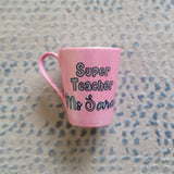 A Shimmery pink hand painted mug with the words 