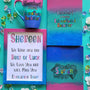 A Gift Set of a mug, notebook, wooden frame and card all painted in gradient colors of (pink-green-blue) . The mug and notebook have the sentence "Teacher? i prefer educational rockstar" and the card and frame has the name shereen