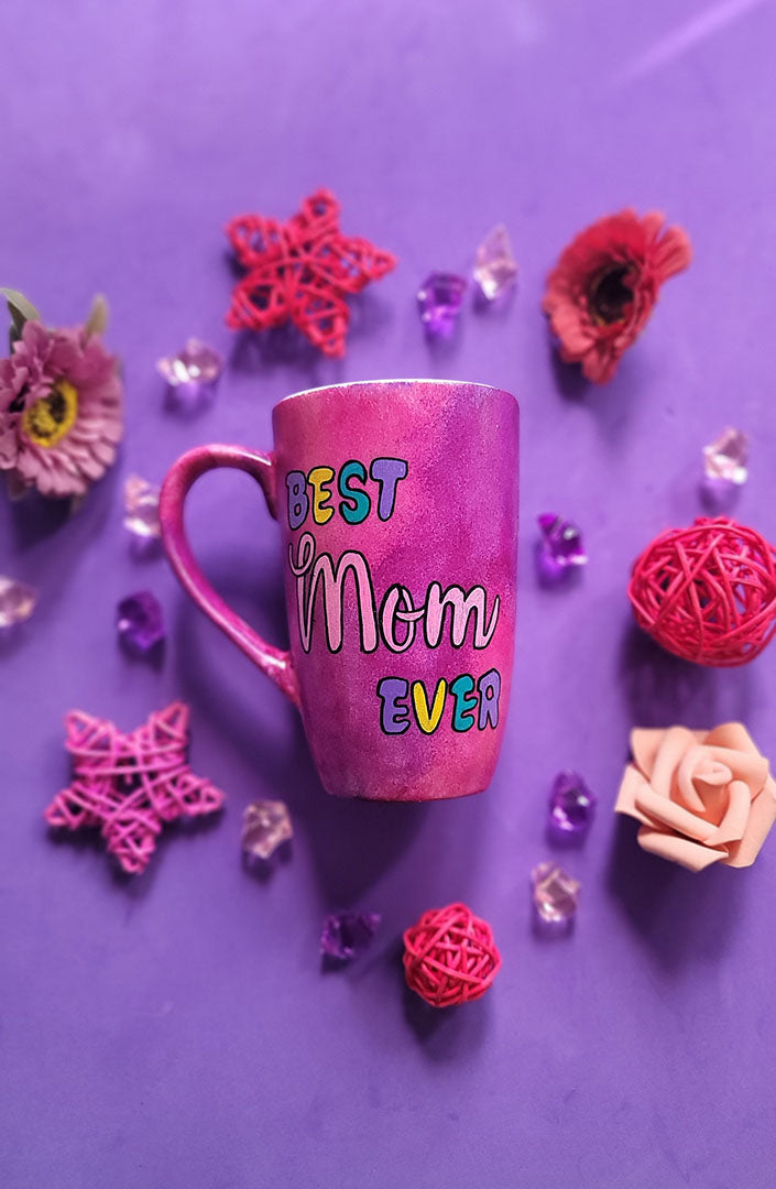 An indian pink hand painted mug with the words Best mom ever