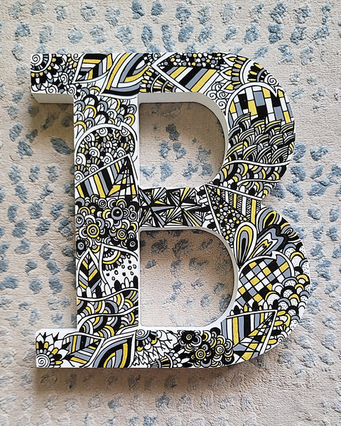 Black and Gold Wooden Letter