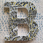 Black and Gold Wooden Letter