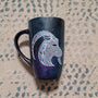 A Hand-painted dark galaxy mug with Capricorn sign in white and colored with patterns of pink blues and greens