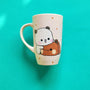 A Pale Pink Hand painted mug with the design of 2 cute bears cuddling (one bear is white and the other is brown)