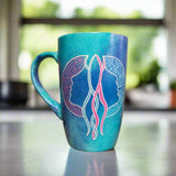 A Hand-painted blue mug with a Gemini sign