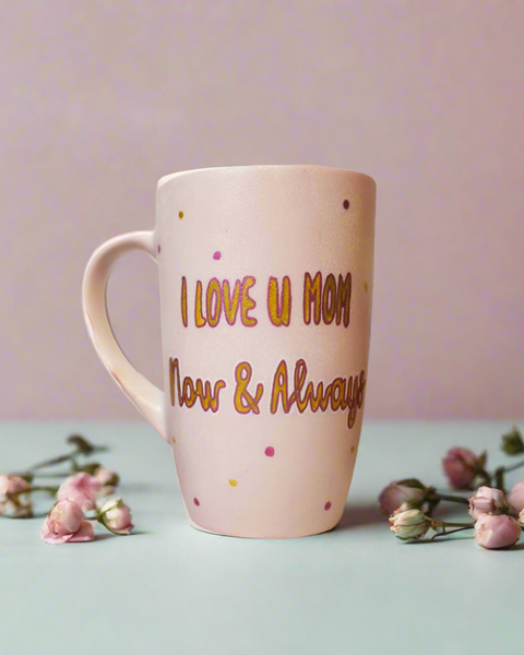 A Pastel Pink Mug with the words "I Love you mom. Now and Always" written in gold outlined by dark pink