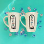 2 hand painted ivory mugs with pharaonic symbols