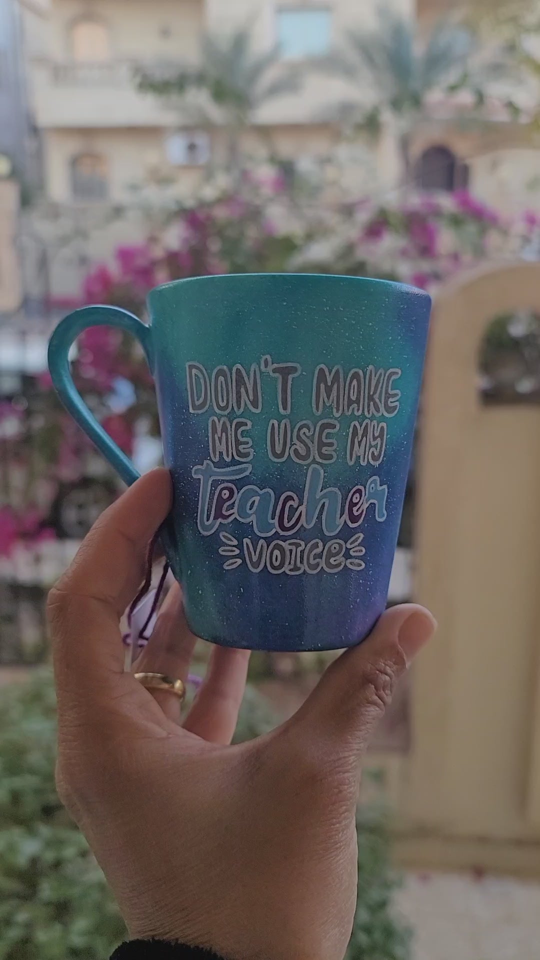  Blue Galaxy hand painted mug with the words "Don't make me use my teacher voice" and the name "Rania" on the other side