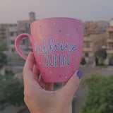 A Hand - painted shimmery pink mug with the words 