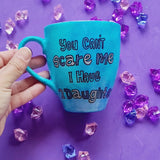 A Blue hand painted mug with the words 