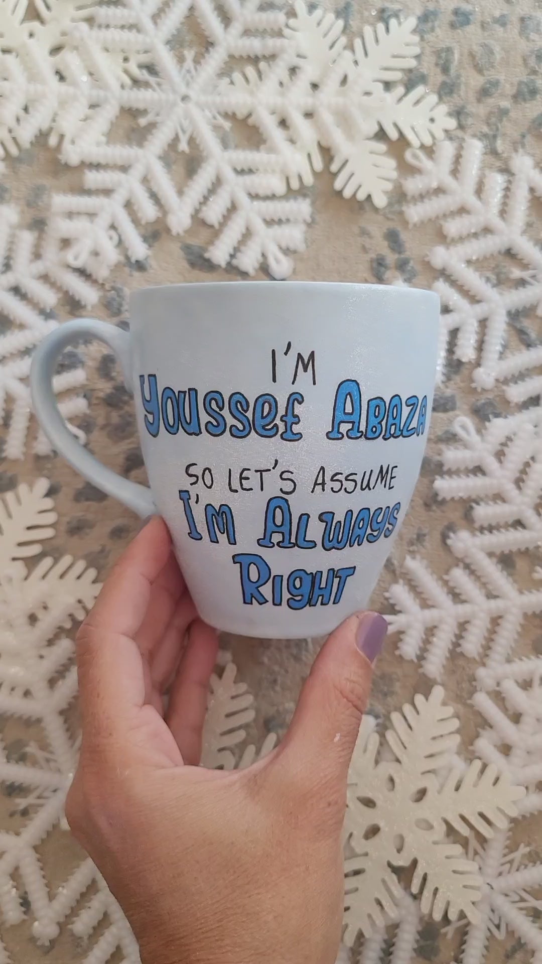 A baby blue hand painted mug with the words "I'm Youssef Abaza,  So lets Assume I'm Always right"