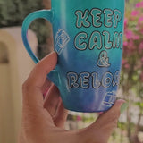 A Blue hand painted mug with the words 