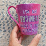 A Pink galaxy hand painted mug with the sentence 