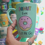 A Pastel green Hand-painted mug with the words 