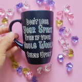 A Shimmery blue hand painted mug with the words 