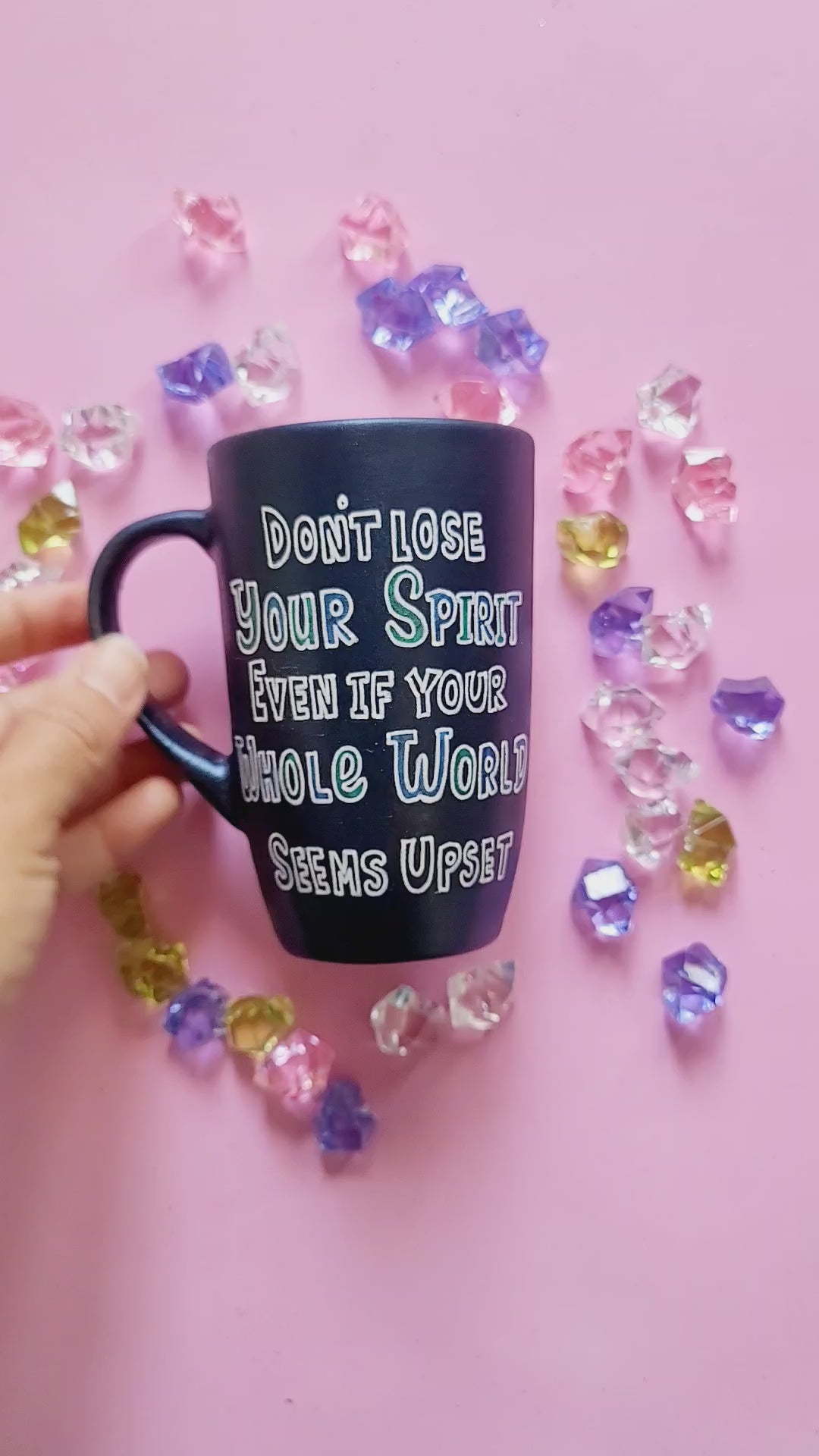 A Shimmery blue hand painted mug with the words "Don't lose your spirit, even if the whole world seems upset" and the other side has the name "Dr.Rawan"