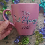 A Shimmery pink hand painted mug with the words 