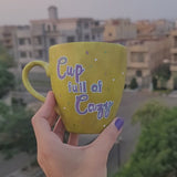 A Handpainted Greenish Bronze Mug with the sentence 