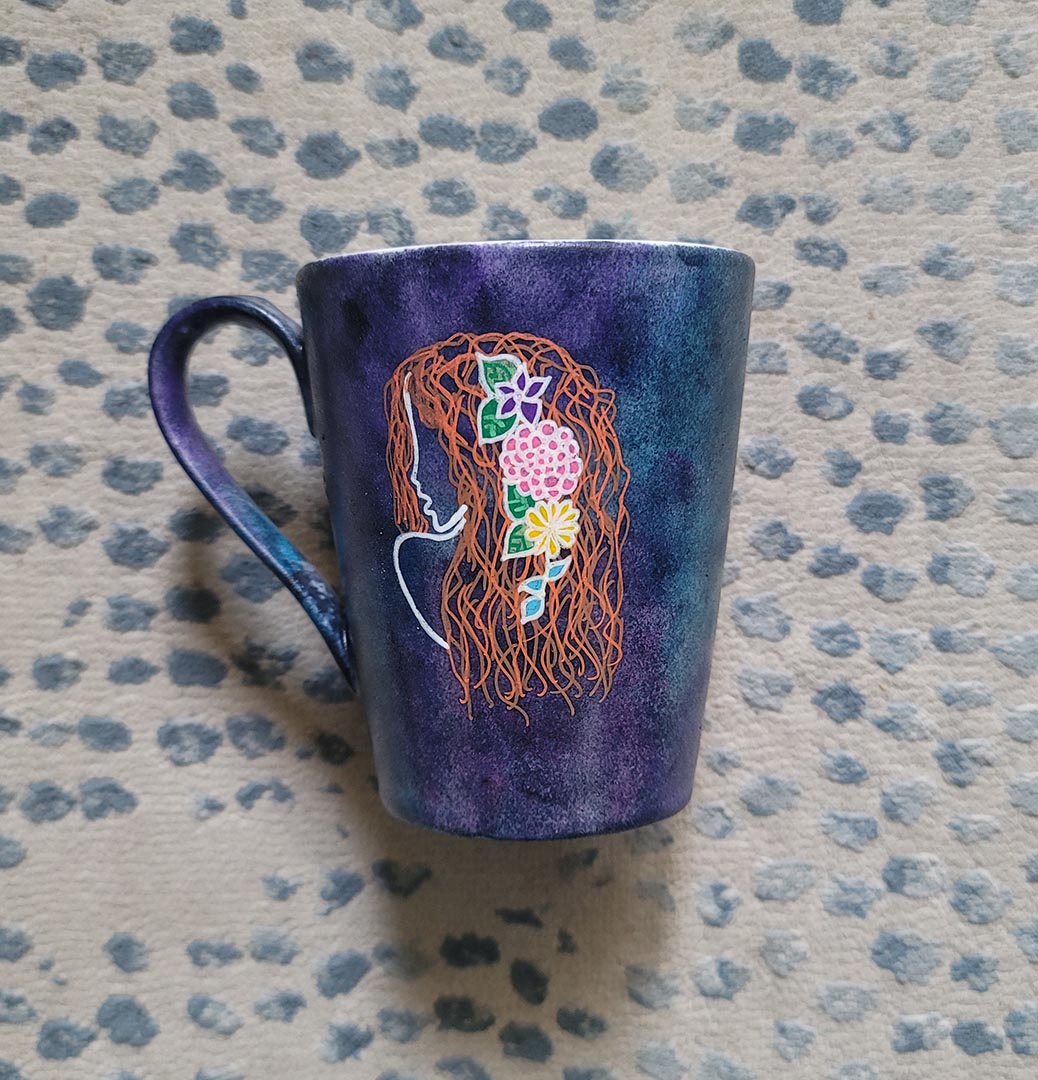 A hand-painted dark sky mug with Virgo sign