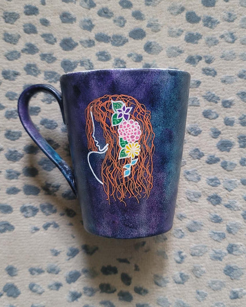 A hand-painted dark sky mug with Virgo sign