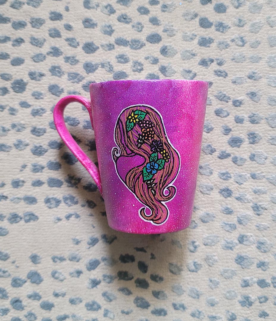 A hand-painted pink galaxy mug with Virgo sign