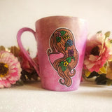 A hand-painted pastel pink mug with Virgo sign