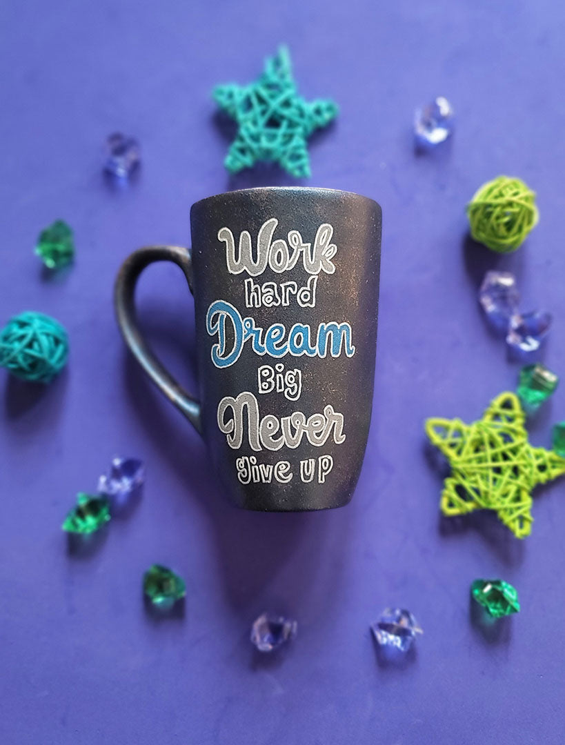 A Shimmery Blue hand painted mug with the sentence "work hard , dream big , never give up"