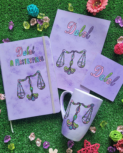 A Hand painted lilac gift set (mug, coaster, notebook and card) all with the libra sign and the name dalal